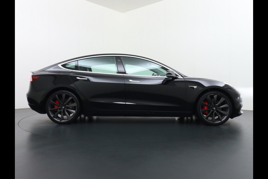 Tesla Model 3 Performance 513pk 20" AutoPilot Pano.dak  Adaptive Cruise Camera''s Leer PDC-A+Voor Wifi Ecc Pdc Dual Motor ! Elektr.-A-Klep+Stuur+Verst.Stoel+Geheugen, Easy Entry Stoel+Bank-Verwarmd Keyless carbon spoiler rode remklauwen Long Range accu WiFi Voorbereid. Internet (9,99pm) 75 kWh 4wd 1e Eigenaar Origineel Nederlandse Auto
