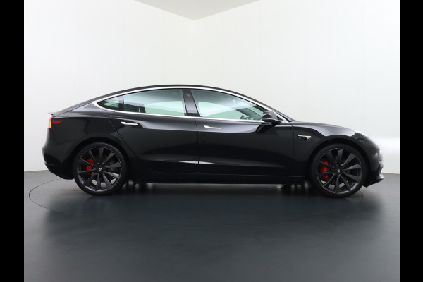 Tesla Model 3 Performance 513pk 20" AutoPilot Pano.dak  Adaptive Cruise Camera''s Leer PDC-A+Voor Wifi Ecc Pdc Dual Motor ! Elektr.-A-Klep+Stuur+Verst.Stoel+Geheugen, Easy Entry Stoel+Bank-Verwarmd Keyless carbon spoiler rode remklauwen Long Range accu WiFi Voorbereid. Internet (9,99pm) 75 kWh 4wd 1e Eigenaar Origineel Nederlandse Auto