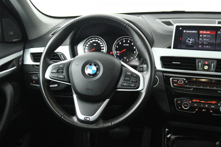 BMW X1 SDrive20i High Executive (PANORAMADAK, HARMAN/KARDON, GROOT-NAVIGATIE, STOELVERWARMING, DEALER ONDERHOUDEN)
