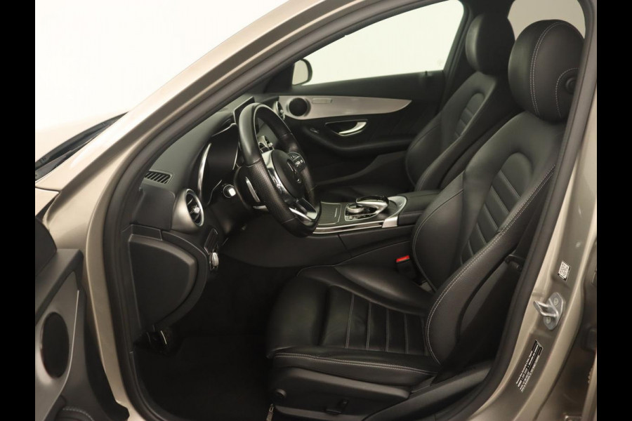 Mercedes-Benz C-Klasse 200 Business Solution AMG | Leder | Carplay | Navigatie | Stoelverwarming | Camera | Adaptive cruise | Full LED | LMV 18 inch