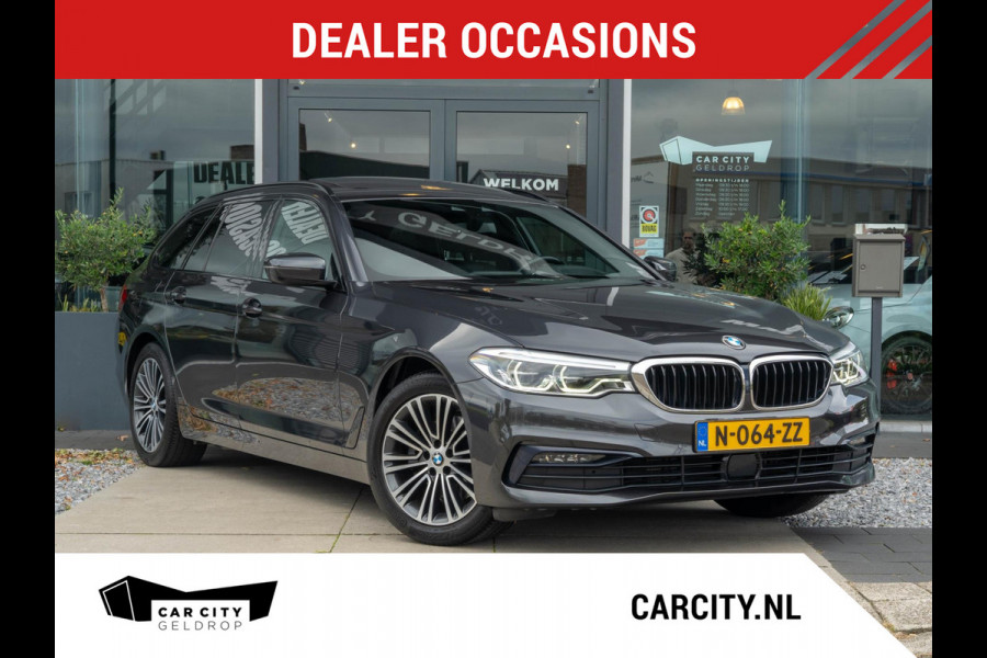 BMW 5 Serie Touring 520i High Executive / HUD / ACC / Pano / CarPlay / Zetelverwarming BMW 5 Serie Touring 520i High Executive / HUD / ACC / Pano / CarPlay / Zetelverwarming