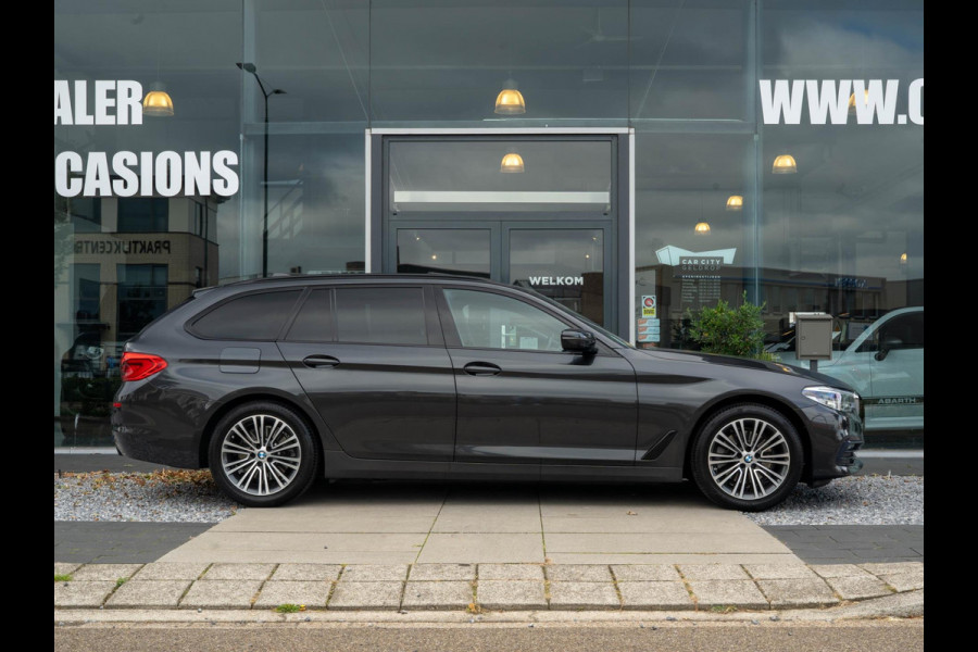 BMW 5 Serie Touring 520i High Executive / HUD / ACC / Pano / CarPlay / Zetelverwarming BMW 5 Serie Touring 520i High Executive / HUD / ACC / Pano / CarPlay / Zetelverwarming