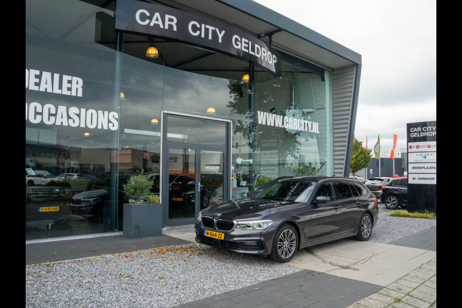 BMW 5 Serie Touring 520i High Executive / HUD / ACC / Pano / CarPlay / Zetelverwarming BMW 5 Serie Touring 520i High Executive / HUD / ACC / Pano / CarPlay / Zetelverwarming