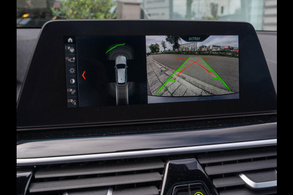 BMW 5 Serie Touring 520i High Executive / HUD / ACC / Pano / CarPlay / Zetelverwarming BMW 5 Serie Touring 520i High Executive / HUD / ACC / Pano / CarPlay / Zetelverwarming