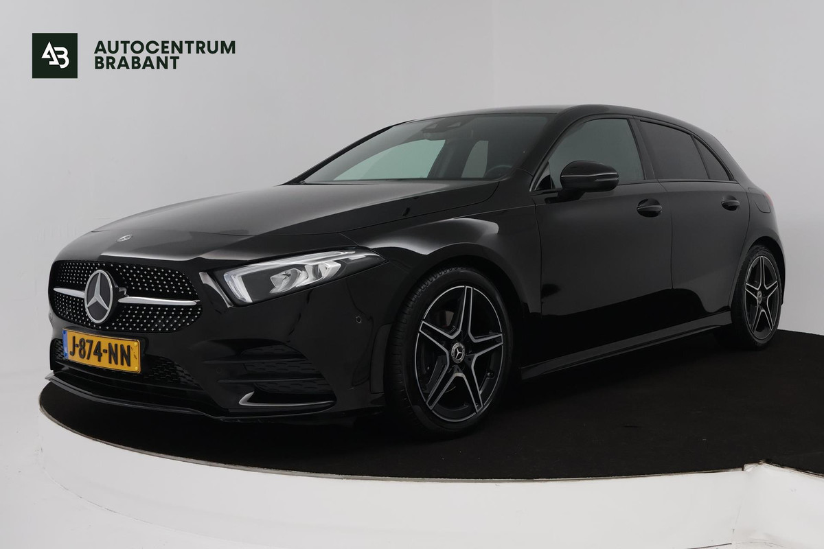 Mercedes-Benz A-Klasse 180 Business Solution AMG (SFEERVERLICHTING, STOELVERWARMING, CRUISE CONTROL, NAVIGATIE, SENSOREN) Mercedes-Benz A-Klasse 180 Business Solution AMG (SFEERVERLICHTING, STOELVERWARMING, CRUISE CONTROL, NAVIGATIE, SENSOREN)
