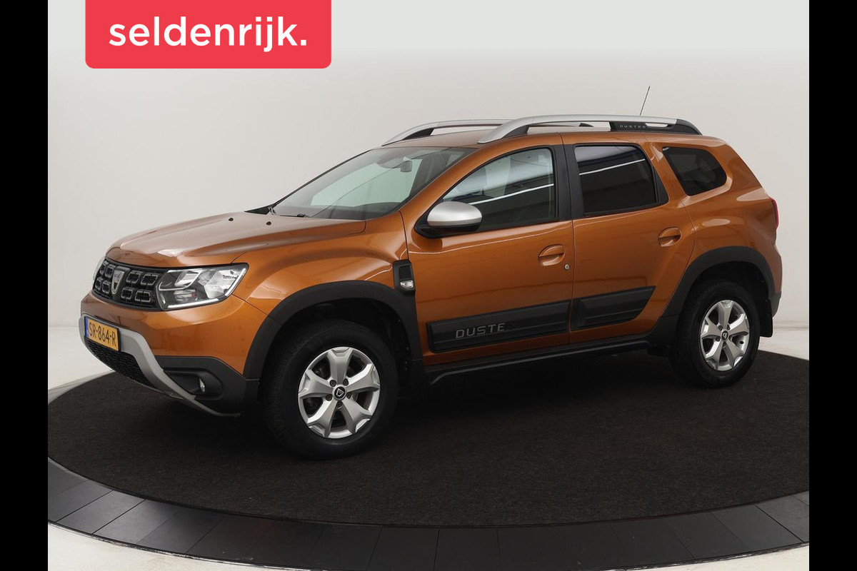 Dacia Duster 1.2 TCe Comfort | Trekhaak | Navigatie | Camera | Cruise control | Airco | Getint glas | DAB Dacia Duster 1.2 TCe Comfort | Trekhaak | Navigatie | Camera | Cruise control | Airco | Getint glas | DAB