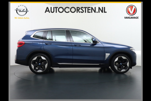 BMW iX3 High Executive 80kWh Leer+Elektr.-verst. Adap.Cruise Apple Carplay Android Auto Navi Ecc 360°Camera Panoramaschuifdak Harman&Kar Stoelverwarming Parkeer+Achteruitrij assistent Led Origineel Nederlandse Auto Zeer compleet! €73.000 nieuw!