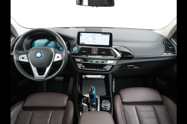 BMW iX3 High Executive 80kWh Leer+Elektr.-verst. Adap.Cruise Apple Carplay Android Auto Navi Ecc 360°Camera Panoramaschuifdak Harman&Kar Stoelverwarming Parkeer+Achteruitrij assistent Led Origineel Nederlandse Auto Zeer compleet! €73.000 nieuw!