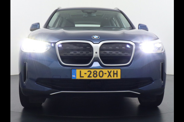 BMW iX3 High Executive 80kWh Leer+Elektr.-verst. Adap.Cruise Apple Carplay Android Auto Navi Ecc 360°Camera Panoramaschuifdak Harman&Kar Stoelverwarming Parkeer+Achteruitrij assistent Led Origineel Nederlandse Auto Zeer compleet! €73.000 nieuw!