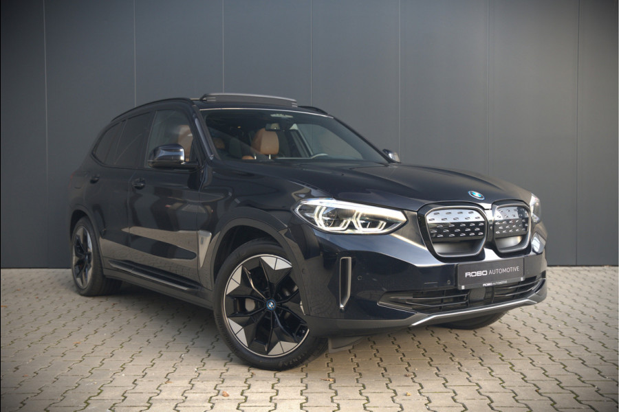 BMW iX3 High Executive 80 kWh | Panoramadak | Keyless | Stoelverwarming | Harman Kardon | Memory Seat | Head-Up Display | 360 Camera | Adaptief Onderstel | Trekhaak | Adaptive LED | Elektrische Stoelen | Apple Carplay | N BMW iX3 High Executive 80 kWh | Panoramadak | Keyless | Stoelverwarming | Harman Kardon | Memory Seat | Head-Up Display | 360 Camera | Adaptief Onderstel | Trekhaak | Adaptive LED | Elektrische Stoelen | Apple Carplay | N
