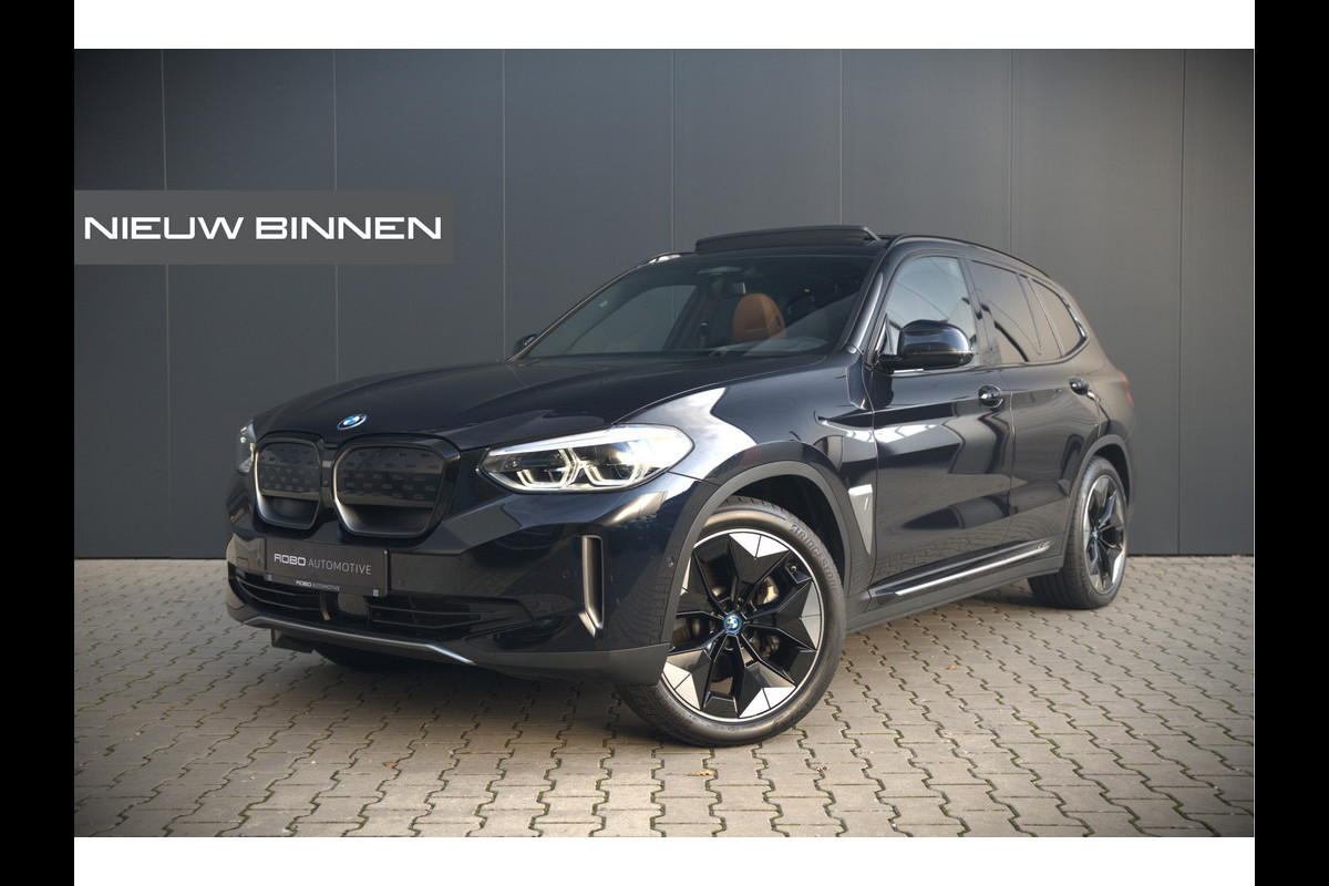 BMW iX3 High Executive 80 kWh | Panoramadak | Keyless | Stoelverwarming | Harman Kardon | Memory Seat | Head-Up Display | 360 Camera | Adaptief Onderstel | Trekhaak | Adaptive LED | Elektrische Stoelen | Apple Carplay | N BMW iX3 High Executive 80 kWh | Panoramadak | Keyless | Stoelverwarming | Harman Kardon | Memory Seat | Head-Up Display | 360 Camera | Adaptief Onderstel | Trekhaak | Adaptive LED | Elektrische Stoelen | Apple Carplay | N
