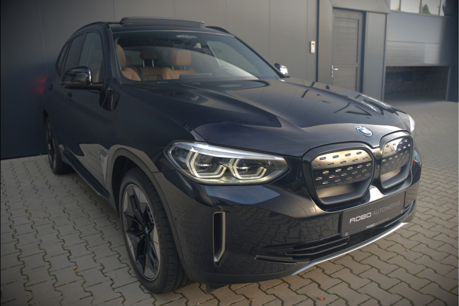 BMW iX3 High Executive 80 kWh | Panoramadak | Keyless | Stoelverwarming | Harman Kardon | Memory Seat | Head-Up Display | 360 Camera | Adaptief Onderstel | Trekhaak | Adaptive LED | Elektrische Stoelen | Apple Carplay | N BMW iX3 High Executive 80 kWh | Panoramadak | Keyless | Stoelverwarming | Harman Kardon | Memory Seat | Head-Up Display | 360 Camera | Adaptief Onderstel | Trekhaak | Adaptive LED | Elektrische Stoelen | Apple Carplay | N