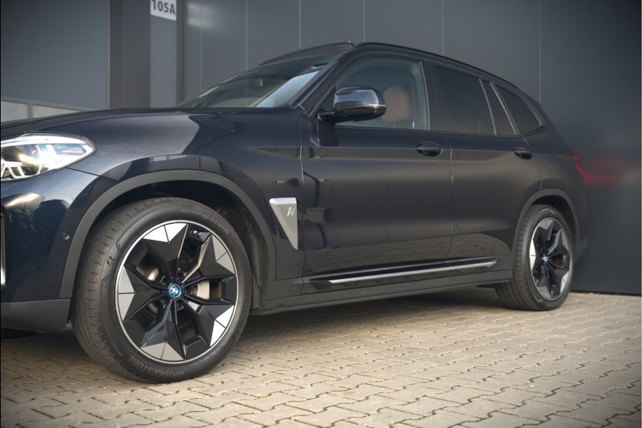 BMW iX3 High Executive 80 kWh | Panoramadak | Keyless | Stoelverwarming | Harman Kardon | Memory Seat | Head-Up Display | 360 Camera | Adaptief Onderstel | Trekhaak | Adaptive LED | Elektrische Stoelen | Apple Carplay | N BMW iX3 High Executive 80 kWh | Panoramadak | Keyless | Stoelverwarming | Harman Kardon | Memory Seat | Head-Up Display | 360 Camera | Adaptief Onderstel | Trekhaak | Adaptive LED | Elektrische Stoelen | Apple Carplay | N