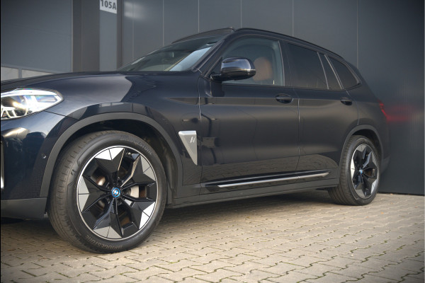 BMW iX3 High Executive 80 kWh | Panoramadak | Keyless | Stoelverwarming | Harman Kardon | Memory Seat | Head-Up Display | 360 Camera | Adaptief Onderstel | Trekhaak | Adaptive LED | Elektrische Stoelen | Apple Carplay | N BMW iX3 High Executive 80 kWh | Panoramadak | Keyless | Stoelverwarming | Harman Kardon | Memory Seat | Head-Up Display | 360 Camera | Adaptief Onderstel | Trekhaak | Adaptive LED | Elektrische Stoelen | Apple Carplay | N