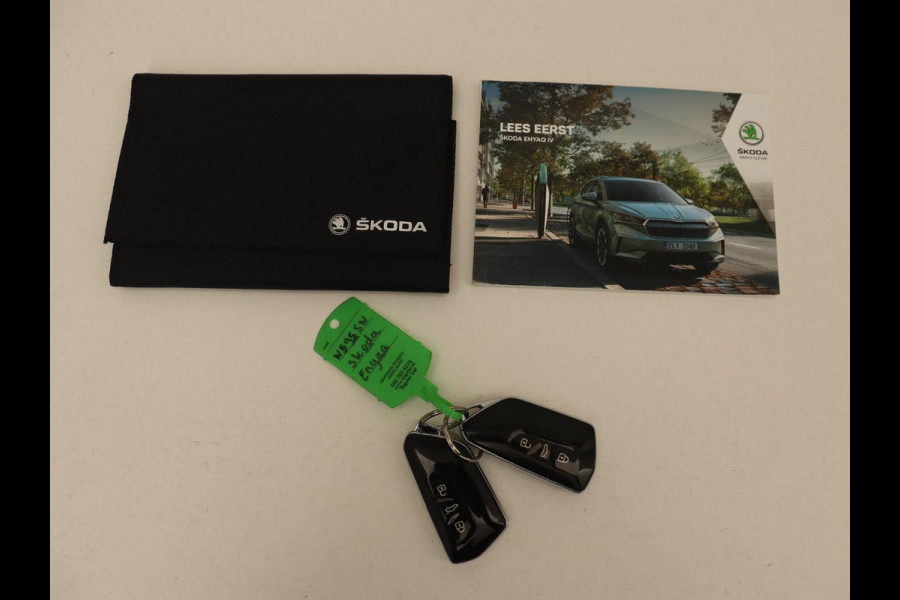 Škoda ENYAQ iV 60 | Stoelverwarming | Trekhaak | Matrix LED | Carplay | Stuurverwarming | Navigatie | Half leder | Cruise control | Parkeerhulp