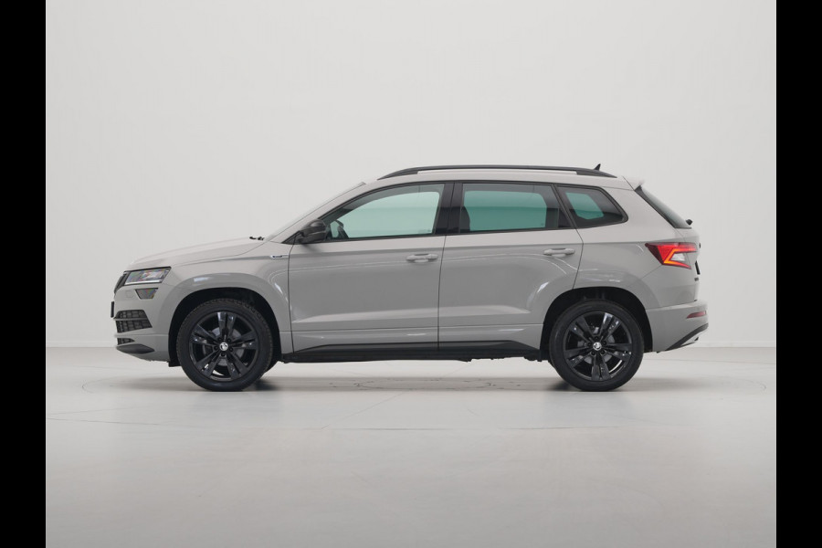 Škoda Karoq 1.5 TSI ACT 150pk DSG Sportline Business Navigatie CantonSound Stoelverwarming Camera Carplay Sideassist 199