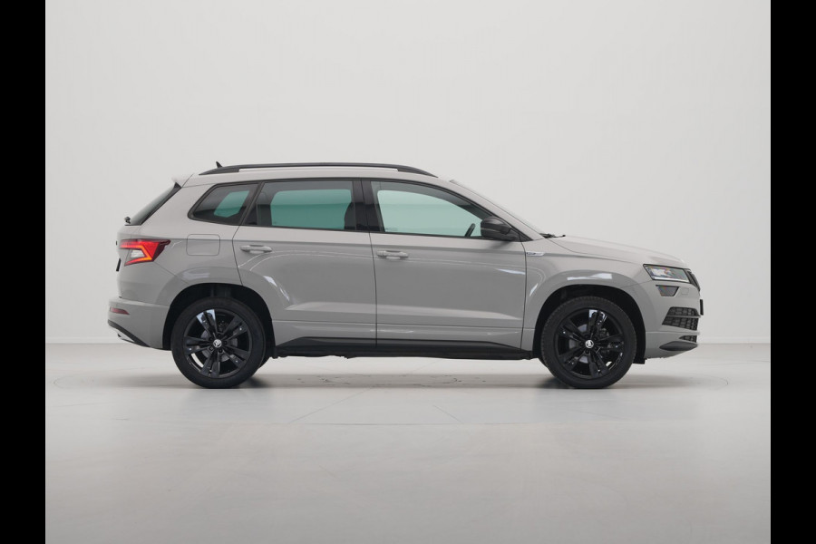 Škoda Karoq 1.5 TSI ACT 150pk DSG Sportline Business Navigatie CantonSound Stoelverwarming Camera Carplay Sideassist 199