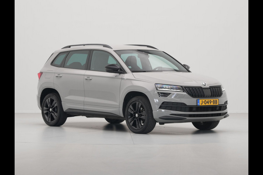 Škoda Karoq 1.5 TSI ACT 150pk DSG Sportline Business Navigatie CantonSound Stoelverwarming Camera Carplay Sideassist 199