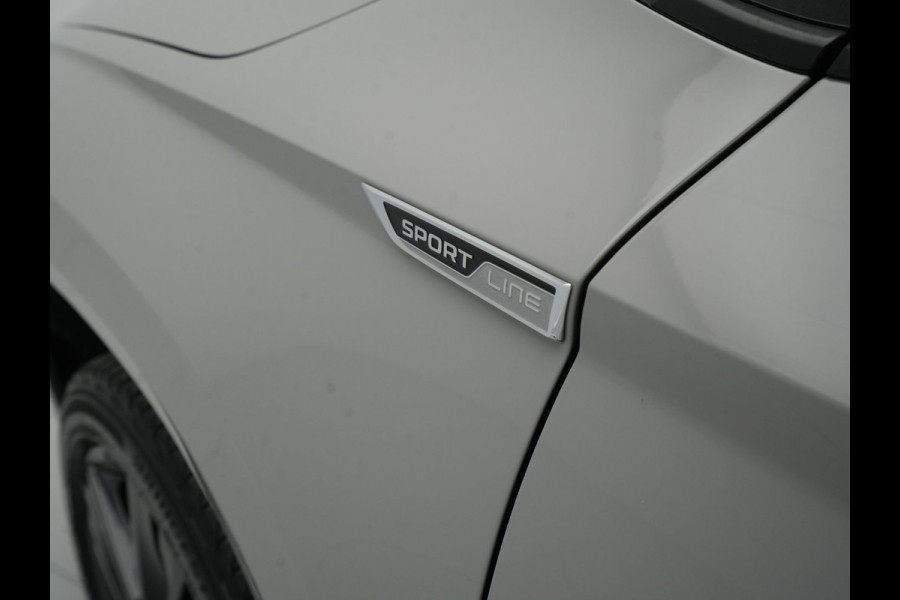 Škoda Karoq 1.5 TSI ACT 150pk DSG Sportline Business Navigatie CantonSound Stoelverwarming Camera Carplay Sideassist 199