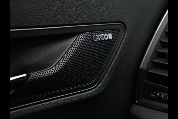 Škoda Karoq 1.5 TSI ACT 150pk DSG Sportline Business Navigatie CantonSound Stoelverwarming Camera Carplay Sideassist 199