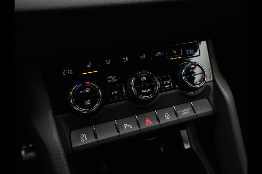 Škoda Karoq 1.5 TSI ACT 150pk DSG Sportline Business Navigatie CantonSound Stoelverwarming Camera Carplay Sideassist 199