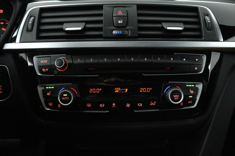 BMW 3-serie 320i High Executive (GROOT-NAVIGATIE, ELEKT. WEGKLAPBARE TREKHAAK, STOELVERWARMING, DEALER ONDERHOUDEN)