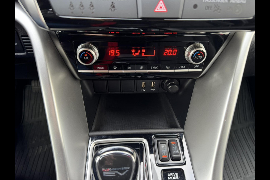 Mitsubishi Eclipse Cross 2.4 PHEV Intense+ Cruise control Climate control Navigatie Apple Android Parkeersensoren plus camera