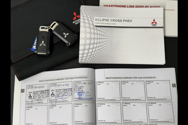Mitsubishi Eclipse Cross 2.4 PHEV Intense+ Cruise control Climate control Navigatie Apple Android Parkeersensoren plus camera