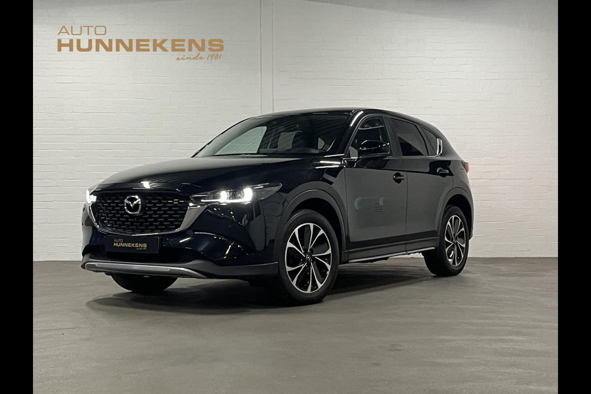 Mazda CX-5 2.5 Newground *Trekhaak* | Carplay | Stoel-/Stuurwielverwarming | Head-up | Climate-/Cruise control | Leder/Alcantara Mazda CX-5 2.5 Newground *Trekhaak* | Carplay | Stoel-/Stuurwielverwarming | Head-up | Climate-/Cruise control | Leder/Alcantara