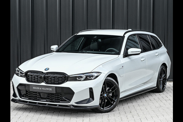 BMW 3 Serie Touring 330e xDrive M-SPORT | FACELIFT | ACCU 19,5 kWh | ACTIVE CRUISE | HIFI AUDIO | CAMERA | FULL-LED | STUUR- EN STOELVERWARM BMW 3 Serie Touring 330e xDrive M-SPORT | FACELIFT | ACCU 19,5 kWh | ACTIVE CRUISE | HIFI AUDIO | CAMERA | FULL-LED | STUUR- EN STOELVERWARM