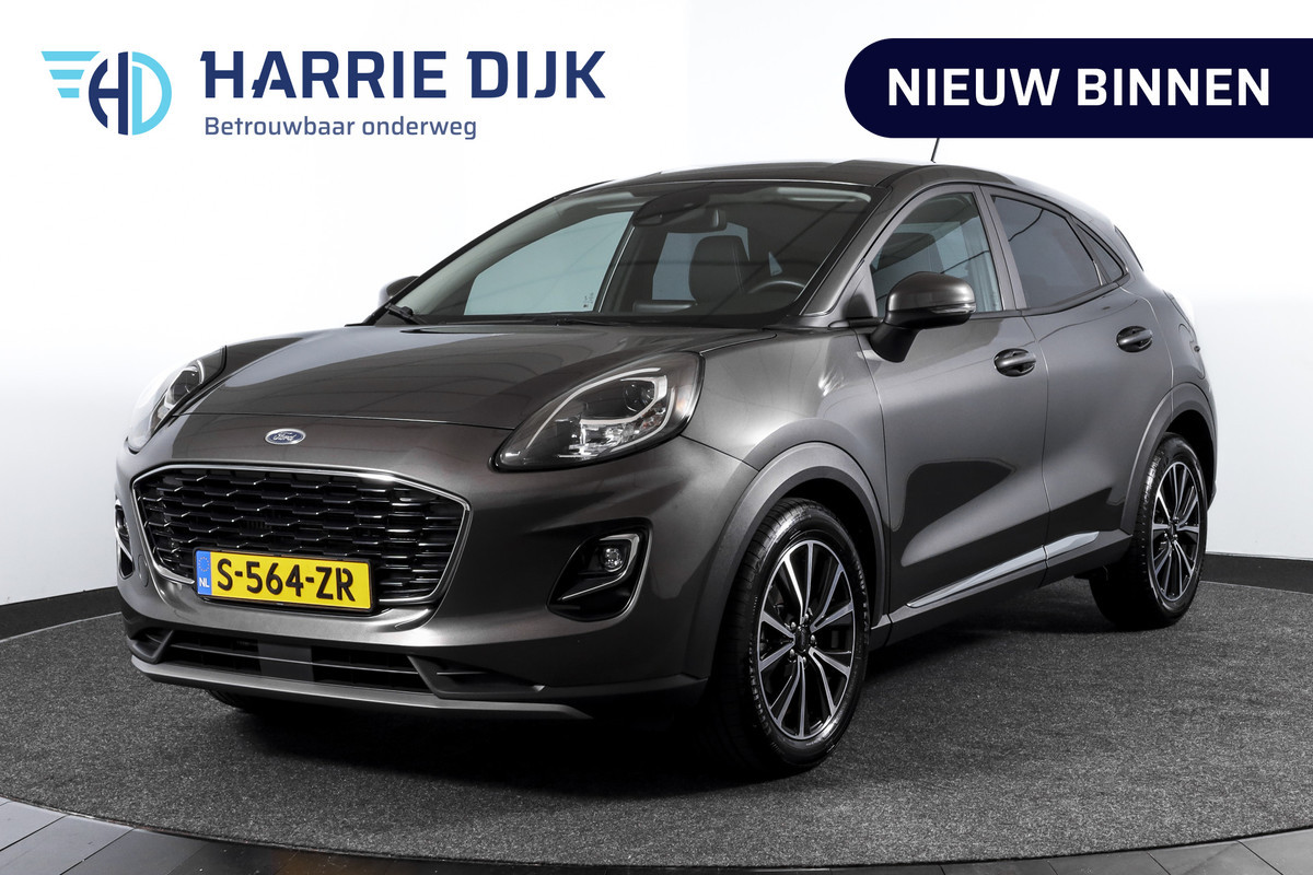 Ford Puma 1.0 EcoBoost Hybrid 125 PK Titanium | Cruise | Stoel-+Stuur-+Voorruitverw. | Massage | PDC | NAV + App. Connect | ECC | DAB | LM 17" | Ford Puma 1.0 EcoBoost Hybrid 125 PK Titanium | Cruise | Stoel-+Stuur-+Voorruitverw. | Massage | PDC | NAV + App. Connect | ECC | DAB | LM 17" |