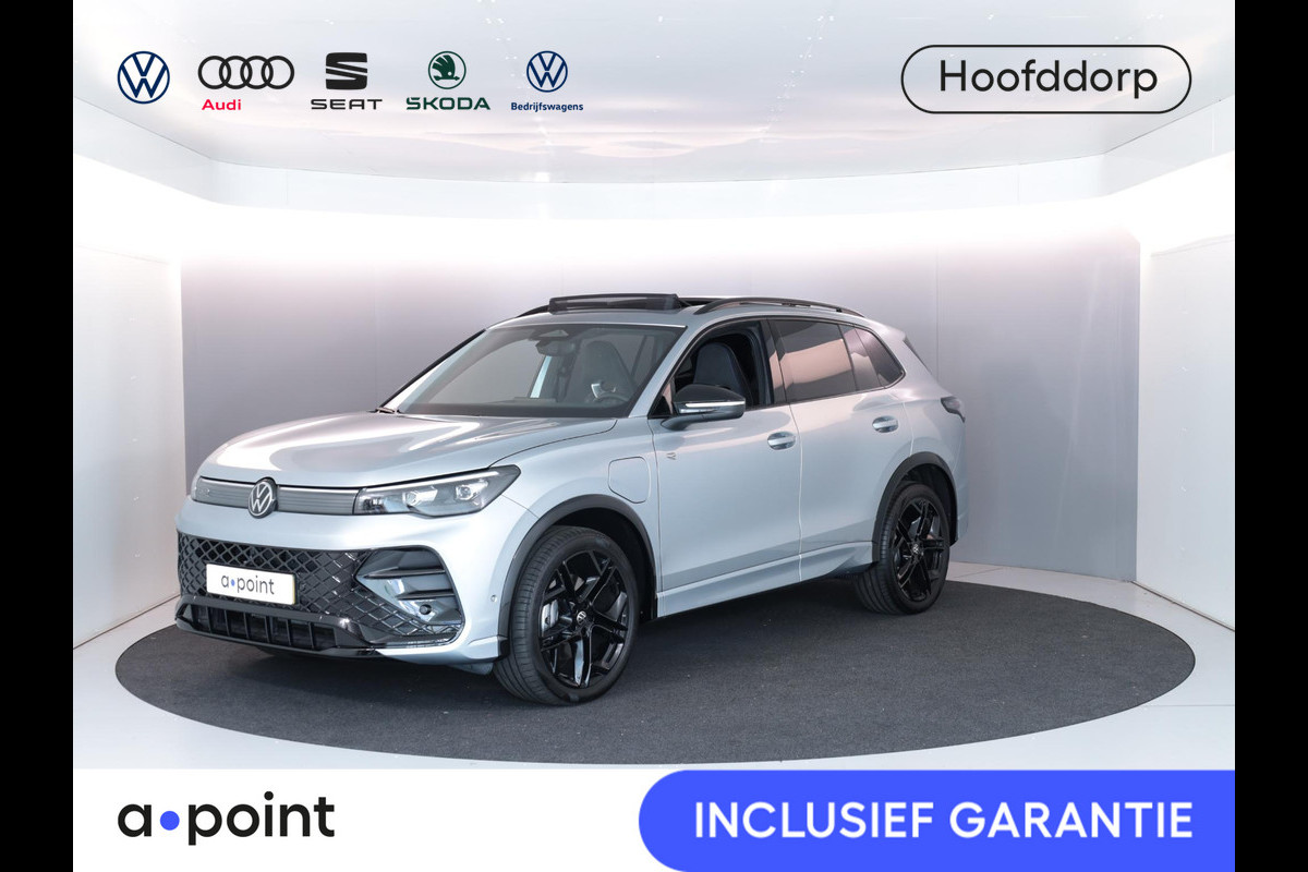 Volkswagen Tiguan 1.5 eHybrid R-Line Edition 204 PK PHEV | Verlengde garantie | Panorama dak | Trekhaak | Black Style | Stoel - en stuurverwarming | Volkswagen Tiguan 1.5 eHybrid R-Line Edition 204 PK PHEV | Verlengde garantie | Panorama dak | Trekhaak | Black Style | Stoel - en stuurverwarming |