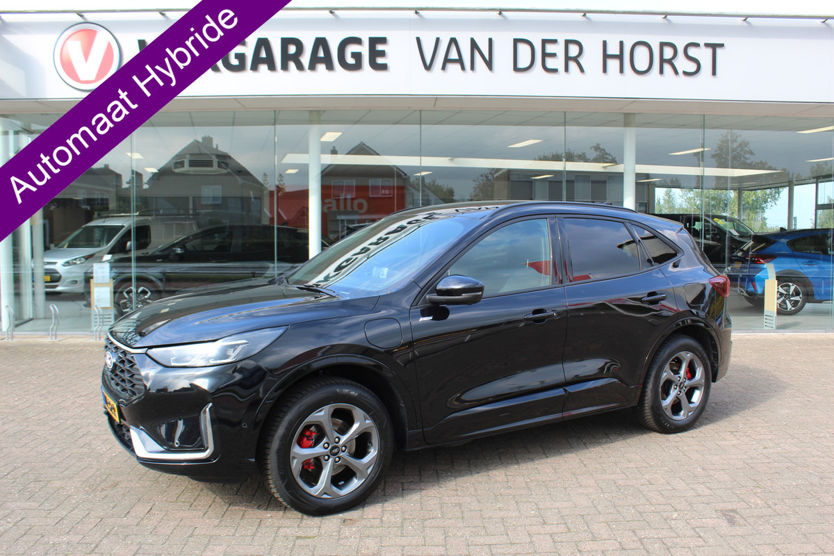 Ford Kuga 2.5 PHEV ST-Line X , 2100kg Trekhaak , Nieuw model Panorama/schuifkantel dak , Trekhaak , AGR stoelen voor 360graden camera , Winter pack , Head Up display Ford Kuga 2.5 PHEV ST-Line X , 2100kg Trekhaak , Nieuw model Panorama/schuifkantel dak , Trekhaak , AGR stoelen voor 360graden camera , Winter pack , Head Up display