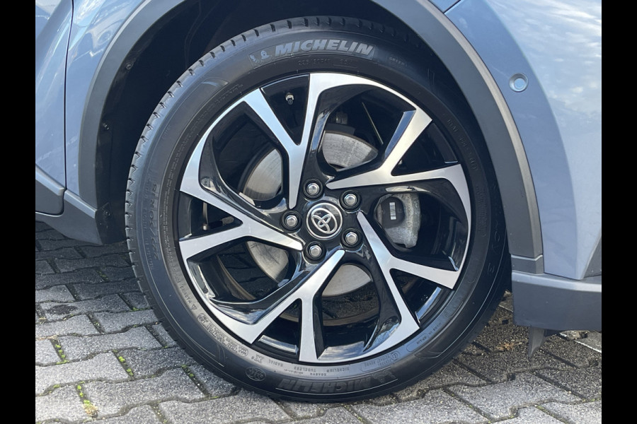 Toyota C-HR 2.0 Hybrid Team D Bi-Tone | Trekhaak | CarPlay | ACC | Camera | LED | DAB+ | Keyless