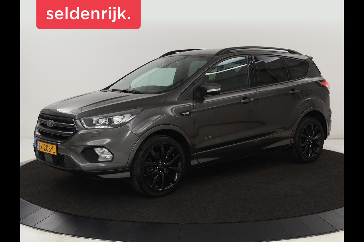 Ford Kuga 1.5 EcoBoost ST Line | Stoelverwarming | Trekhaak | Half leder | Carplay | Camera | Park Assist | Navigatie | Climate control | Cruise control Ford Kuga 1.5 EcoBoost ST Line | Stoelverwarming | Trekhaak | Half leder | Carplay | Camera | Park Assist | Navigatie | Climate control | Cruise control