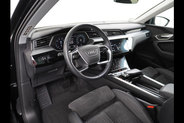 Audi e-tron 55 Quattro 95kWh 408PK Trekhaak Leder/Alcantara-Sportstoel Panoramadak Adap.Cruise Navi Ecc Stoelverwarming Business Edition Plus Luchtvering Memory Lmv Elek.Achterklep Privacy Glas Keyless 1e Eigenaar 1.800KG Trekgewicht Zeer compleet!