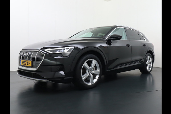 Audi e-tron 55 Quattro 95kWh 408PK Trekhaak Leder/Alcantara-Sportstoel Panoramadak Adap.Cruise Navi Ecc Stoelverwarming Business Edition Plus Luchtvering Memory Lmv Elek.Achterklep Privacy Glas Keyless 1e Eigenaar 1.800KG Trekgewicht Zeer compleet!