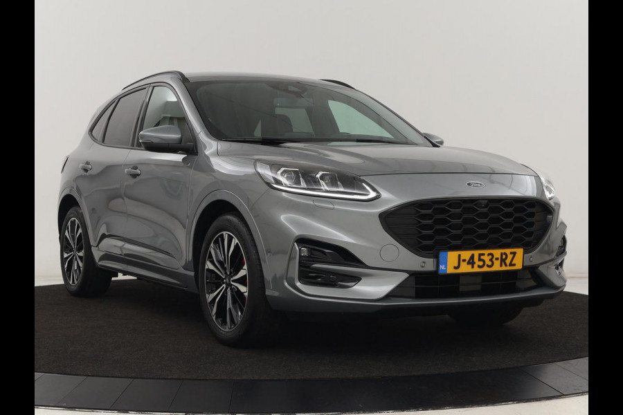 Ford Kuga 2.5 PHEV ST-Line X | Head-Up | Stoelverwarming | Adaptive cruise | 360 Camera | B&O Sound | Leder/Alcantara | Carplay | Achterbankverwarming | Navigatie | Keyless | Full LED | Digital Cockpit | Plug In