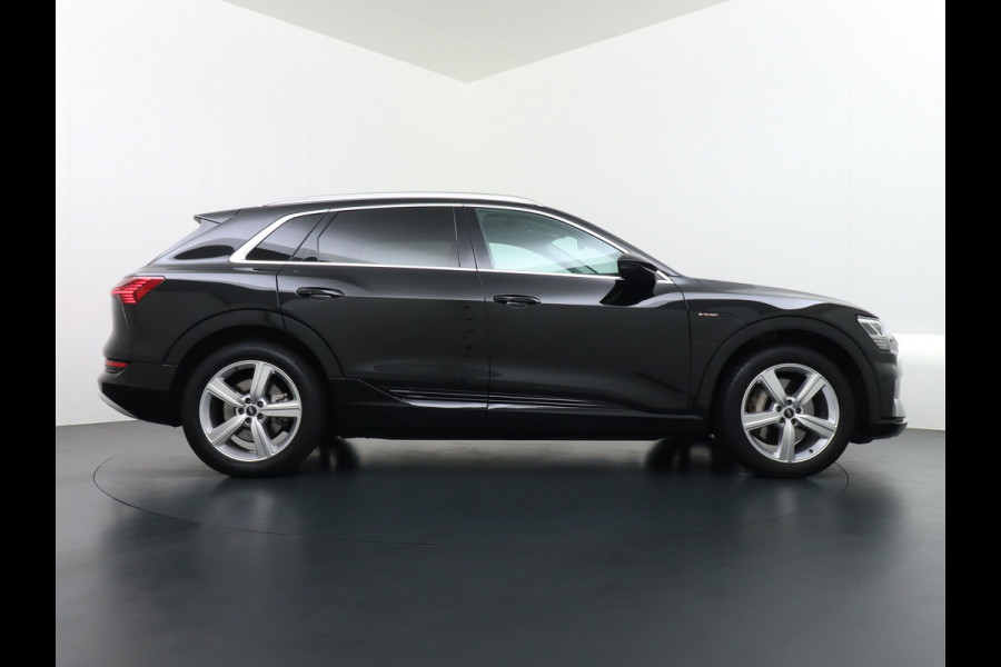Audi e-tron 55 Quattro 95kWh 408PK Trekhaak Leder/Alcantara-Sportstoel Panoramadak Adap.Cruise Navi Ecc Stoelverwarming Business Edition Plus Luchtvering Memory Lmv Elek.Achterklep Privacy Glas Keyless 1e Eigenaar 1.800KG Trekgewicht Zeer compleet!