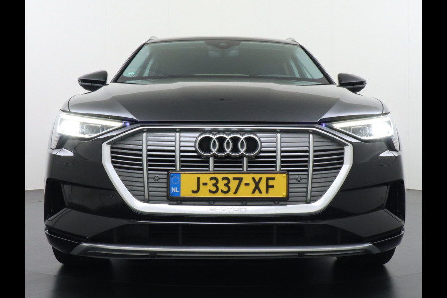 Audi e-tron 55 Quattro 95kWh 408PK Trekhaak Leder/Alcantara-Sportstoel Panoramadak Adap.Cruise Navi Ecc Stoelverwarming Business Edition Plus Luchtvering Memory Lmv Elek.Achterklep Privacy Glas Keyless 1e Eigenaar 1.800KG Trekgewicht Zeer compleet!