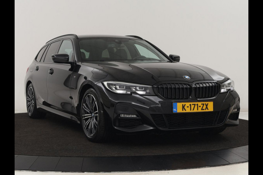 BMW 3 Serie 318i M Sport | Sportstoelen | Half leder | Carplay | Navigatie | Camera | Parkeerhulp | Climate control | Cruise control