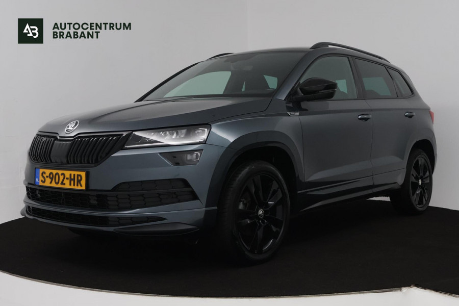 Škoda Karoq 1.5 TSI ACT Sportline Business (DIGITALE COCKPIT, STOEL/STUUR VERWARMING, TREKHAAK, SFEERVERLICHTING, CAMERA)