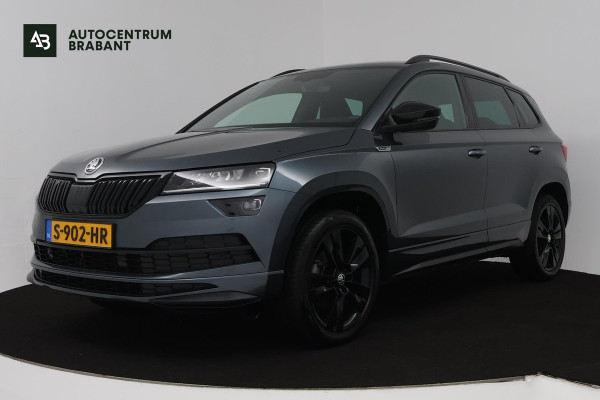 Škoda Karoq 1.5 TSI ACT Sportline Business (DIGITALE COCKPIT, STOEL/STUUR VERWARMING, TREKHAAK, SFEERVERLICHTING, CAMERA)