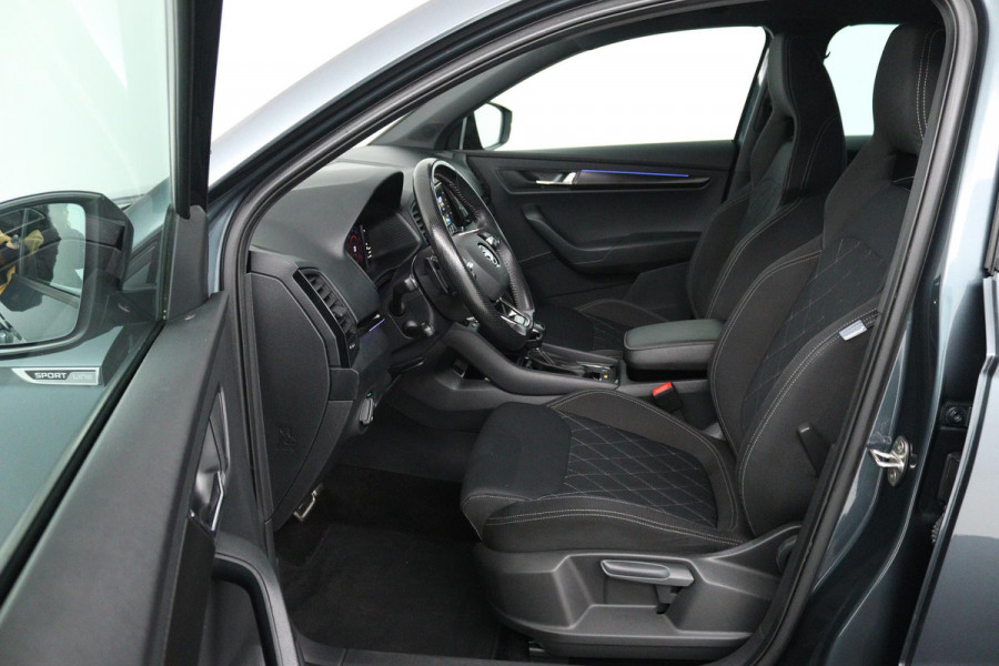 Škoda Karoq 1.5 TSI ACT Sportline Business (DIGITALE COCKPIT, STOEL/STUUR VERWARMING, TREKHAAK, SFEERVERLICHTING, CAMERA)