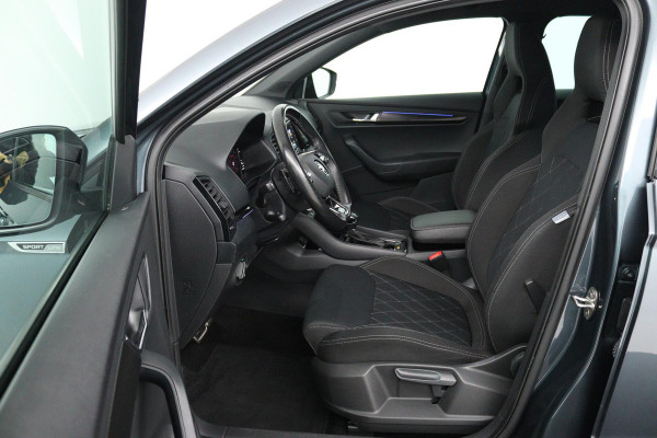 Škoda Karoq 1.5 TSI ACT Sportline Business (DIGITALE COCKPIT, STOEL/STUUR VERWARMING, TREKHAAK, SFEERVERLICHTING, CAMERA)