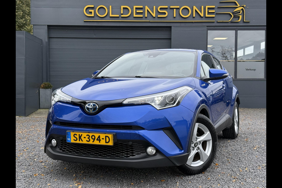 Toyota C-HR 1.8 Hybrid Active 1e Eigenaar,Navi,Clima,Camera,Cruise,PDC,N.A.P,APK tot 04-2026 Toyota C-HR 1.8 Hybrid Active 1e Eigenaar,Navi,Clima,Camera,Cruise,PDC,N.A.P,APK tot 04-2026