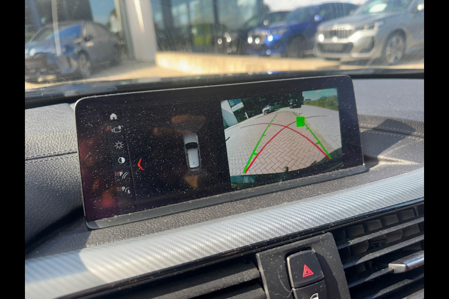 BMW 3 Serie Touring 320i M Sport Edition / Trekhaak / Panoramadak / Camera / Head-up / Leder / 19'' / Navigatie / Stoelverwarming / Audio HiFi / Cruise Control