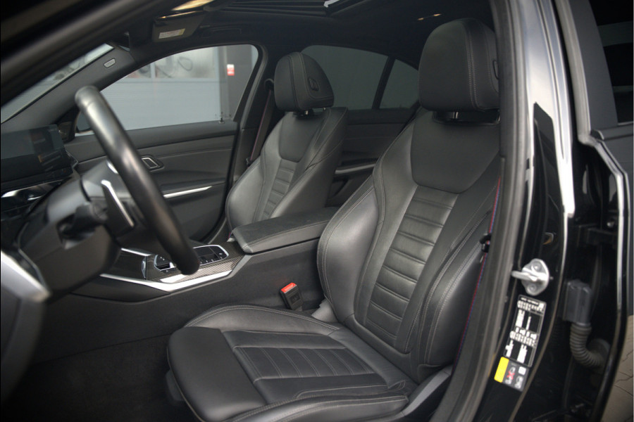 BMW 3-serie 320e High Executive M Sport | Panoramadak | Harman Kardon | Carbon | Camera | Adaptive LED | Stoelverwarming | Stuurverwarming | Apple Carplay | Navigatie | Cruise Control | Memory Seat | Trekhaak | Keyless | Shadowline
