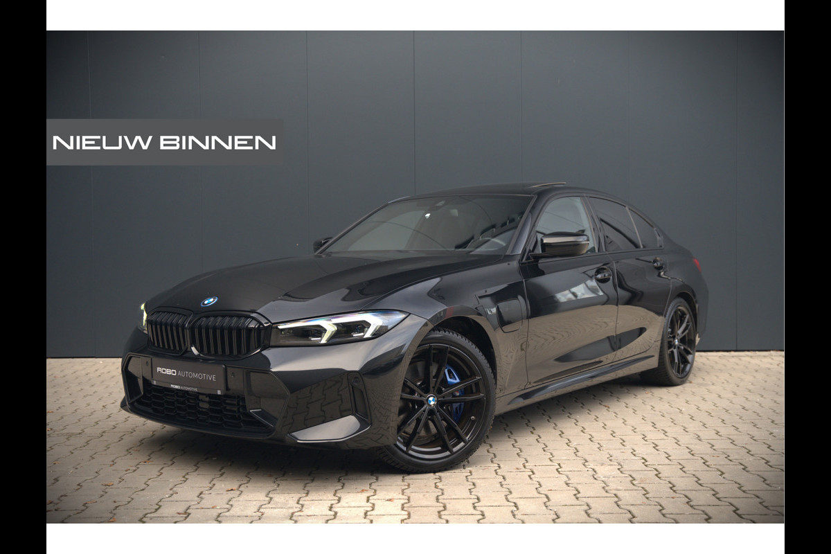 BMW 3-serie 320e High Executive M Sport | Panoramadak | Harman Kardon | Carbon | Camera | Adaptive LED | Stoelverwarming | Stuurverwarming | Apple Carplay | Navigatie | Cruise Control | Memory Seat | Trekhaak | Keyless | Shadowline