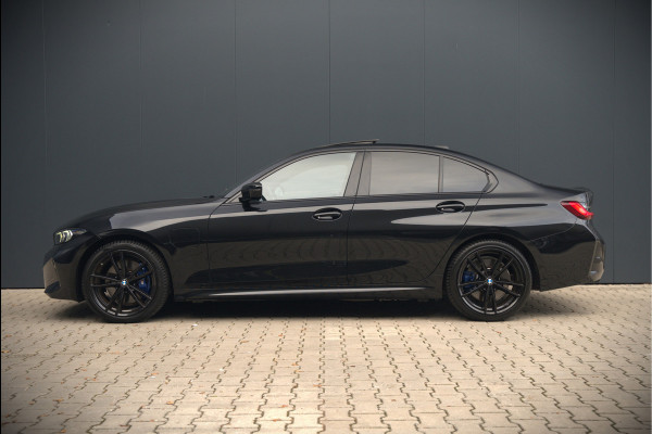 BMW 3-serie 320e High Executive M Sport | Panoramadak | Harman Kardon | Carbon | Camera | Adaptive LED | Stoelverwarming | Stuurverwarming | Apple Carplay | Navigatie | Cruise Control | Memory Seat | Trekhaak | Keyless | Shadowline